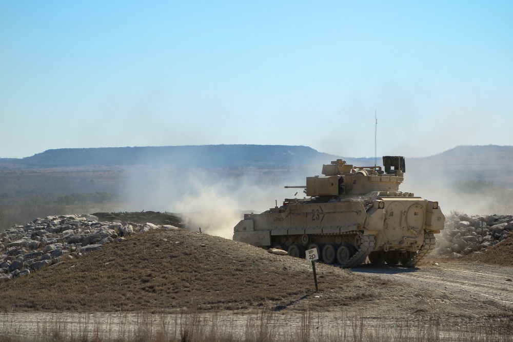 M2A3 Bradley Fighting Vehicle engages targets during 3ABCT/1CD CALFEX