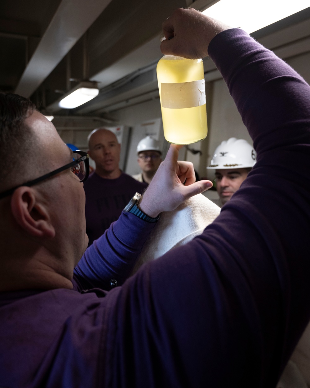 Nimitz Chief Inspects a Fuel Sample