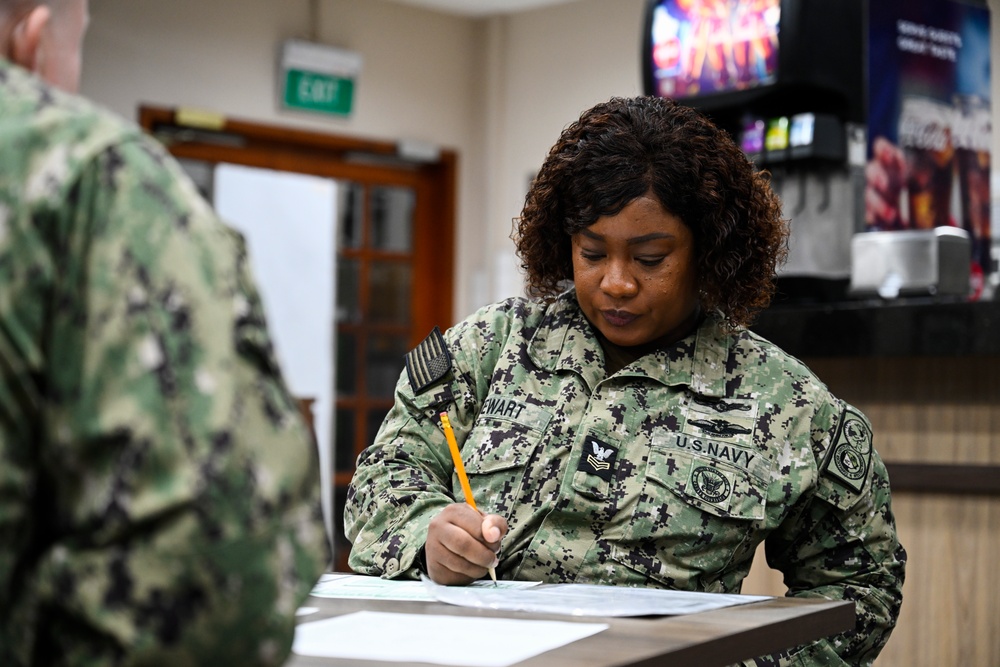 COMLOG WESTPAC Sailors take E-7 Navy-wide advancement exam.