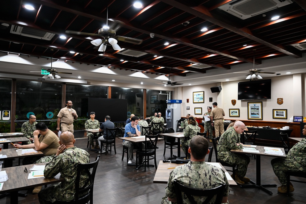 COMLOG WESTPAC Sailors take E-7 Navy-wide advancement exam.