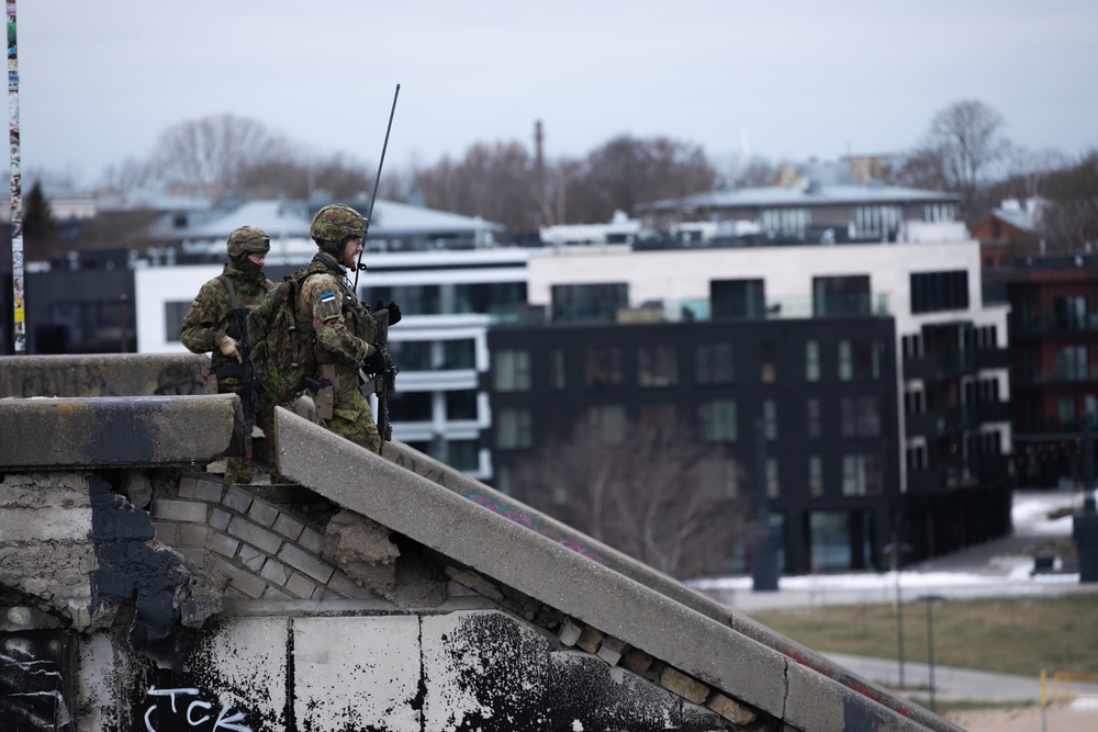 U.S. Soldiers assigned to 2-227th AR and Estonian Forces conduct a Protective Service Detail Training Exercise