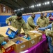 U.S. Army National Guard Soldiers assigned to Joint Task Force - District of Columbia Receive Snacks and Toiletries from the Family Readiness Team at the D.C. Armory