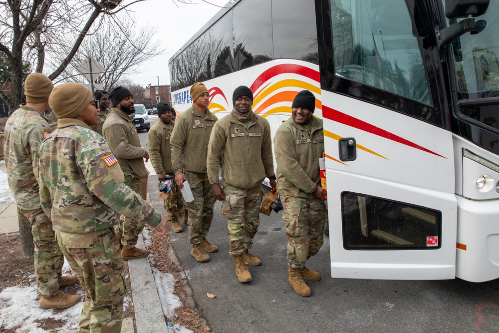 Maryland Army National Guard Soldiers Assigned to Joint Task Force - District of Columbia Depart from the D.C. Armory After the 60th Presidential Inauguration