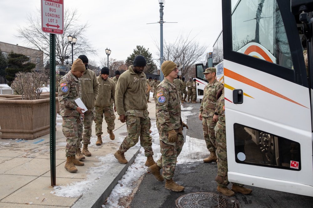 Maryland Army National Guard Soldiers Assigned to Joint Task Force - District of Columbia Depart from the D.C. Armory After the 60th Presidential Inauguration