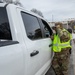 U.S. Army Staff Sgt. Anthony Cintron Directs a Vehicle at the D.C. Armory