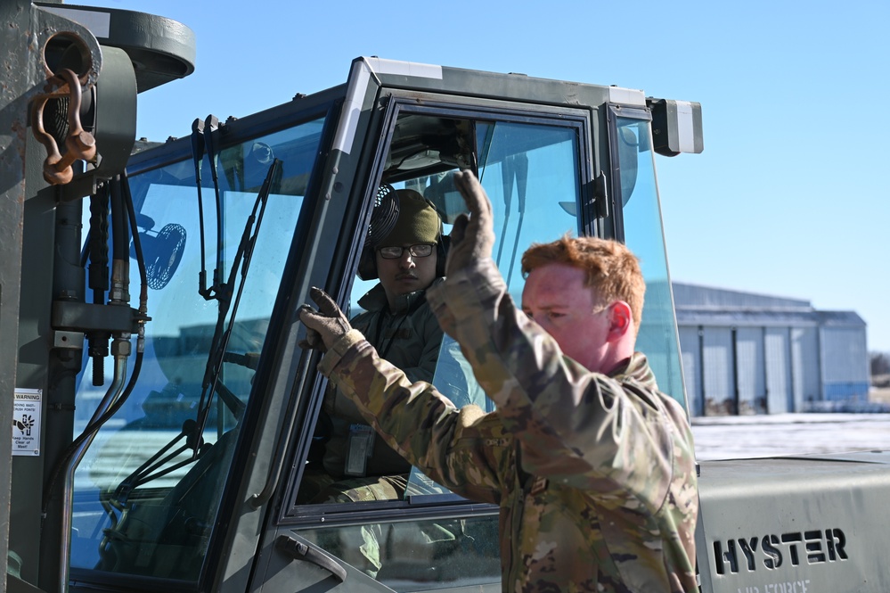 Wisconsin Airmen load C-130s in preparation for Sentry Savannah exercise