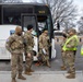 Massachusetts Army National Guardsmen Direct Soldiers Towards Out-Processing at the D.C. Armory