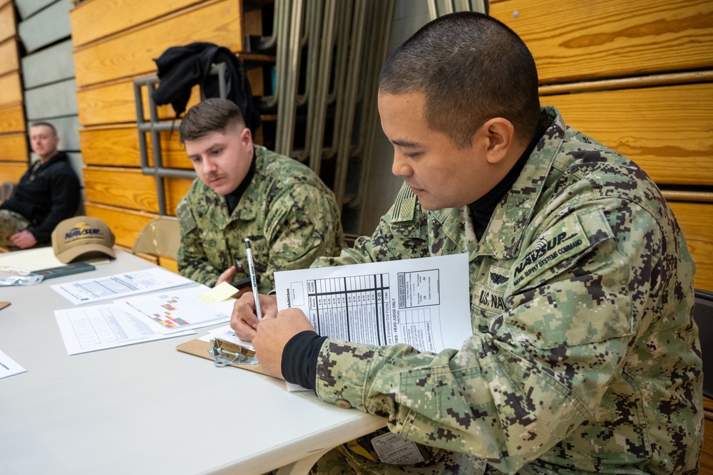 Sailors from NAVSUP headquarters serve as judges for the NJROTC program in the Mid-Atlantic Competition.