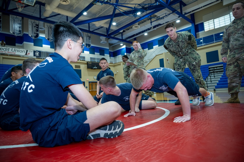 Sailors from NAVSUP headquarters serve as judges for the NJROTC program in the Mid-Atlantic Competition.