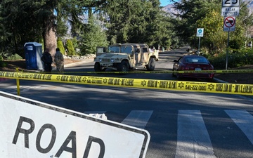 California National Guardsmen set up camp at Rose Bowl Stadium while firefighting efforts continue