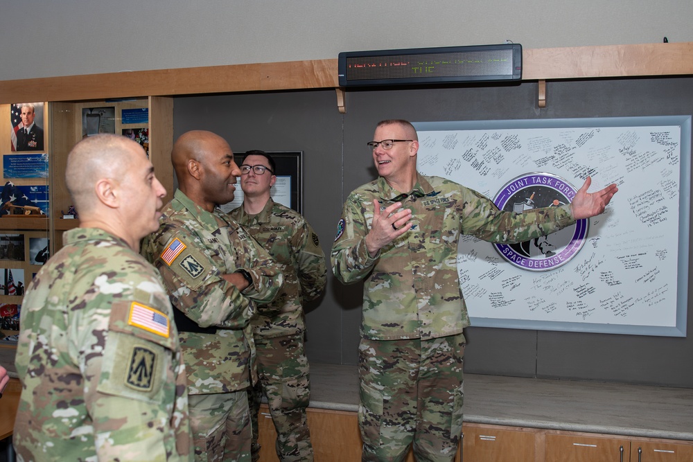 USASMDC commander visits NSDC, presents Basic Space Badge to Soldier