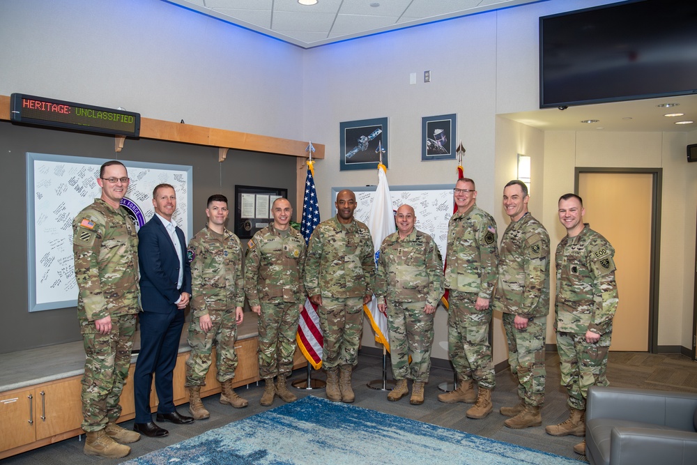 USASMDC commander visits NSDC, presents Basic Space Badge to Soldier