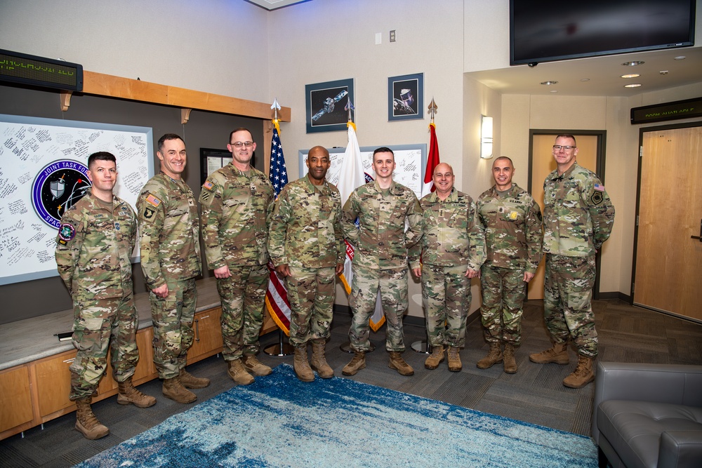 USASMDC commander visits NSDC, presents Basic Space Badge to Soldier