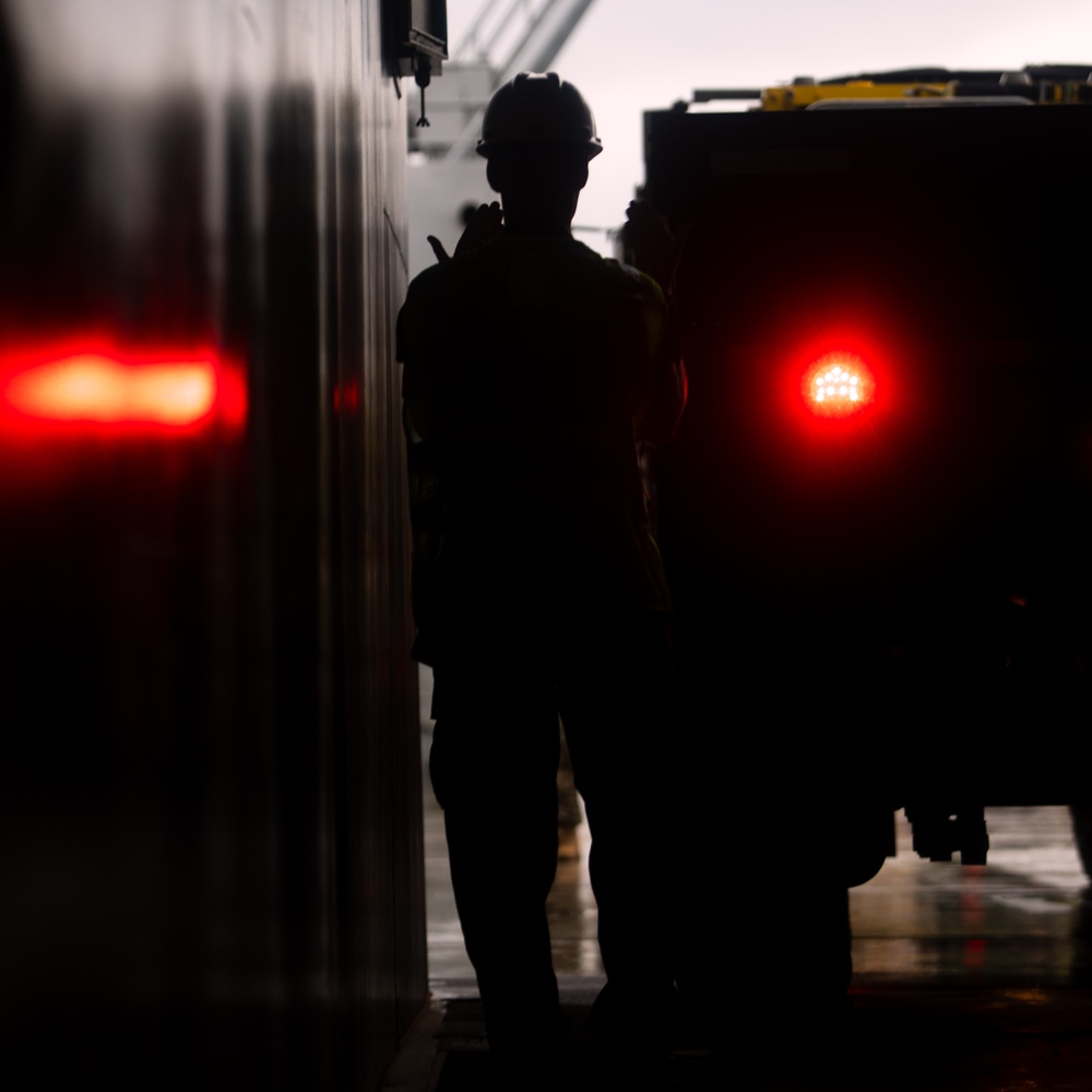 US Army Mariners load US Marines' gear onto LSV 4 for Big Island Combat Readiness Evaluation