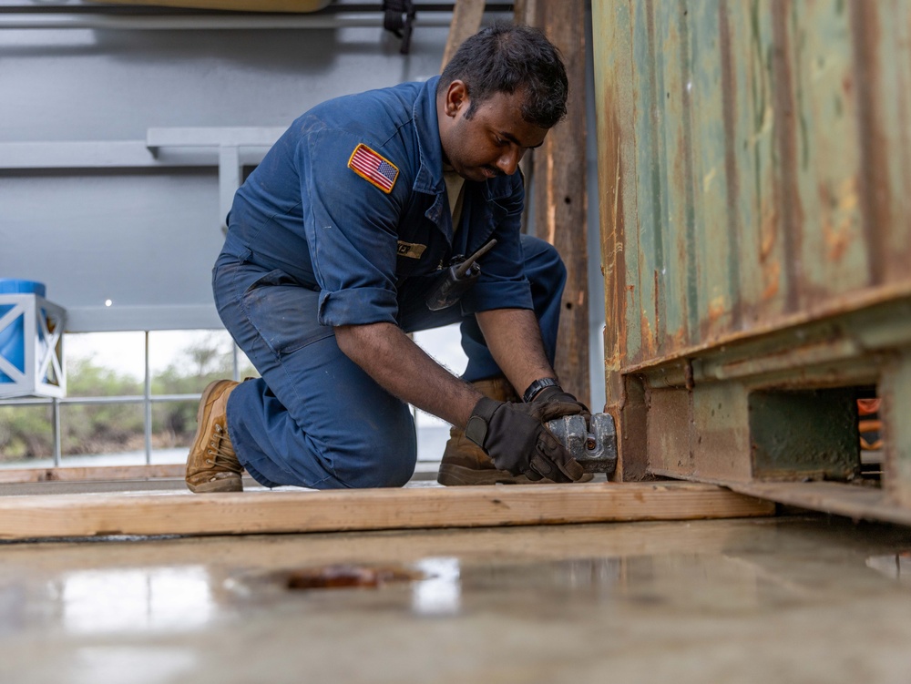 US Army Mariners load US Marines' gear onto LSV 4 for Big Island Combat Readiness Evaluation