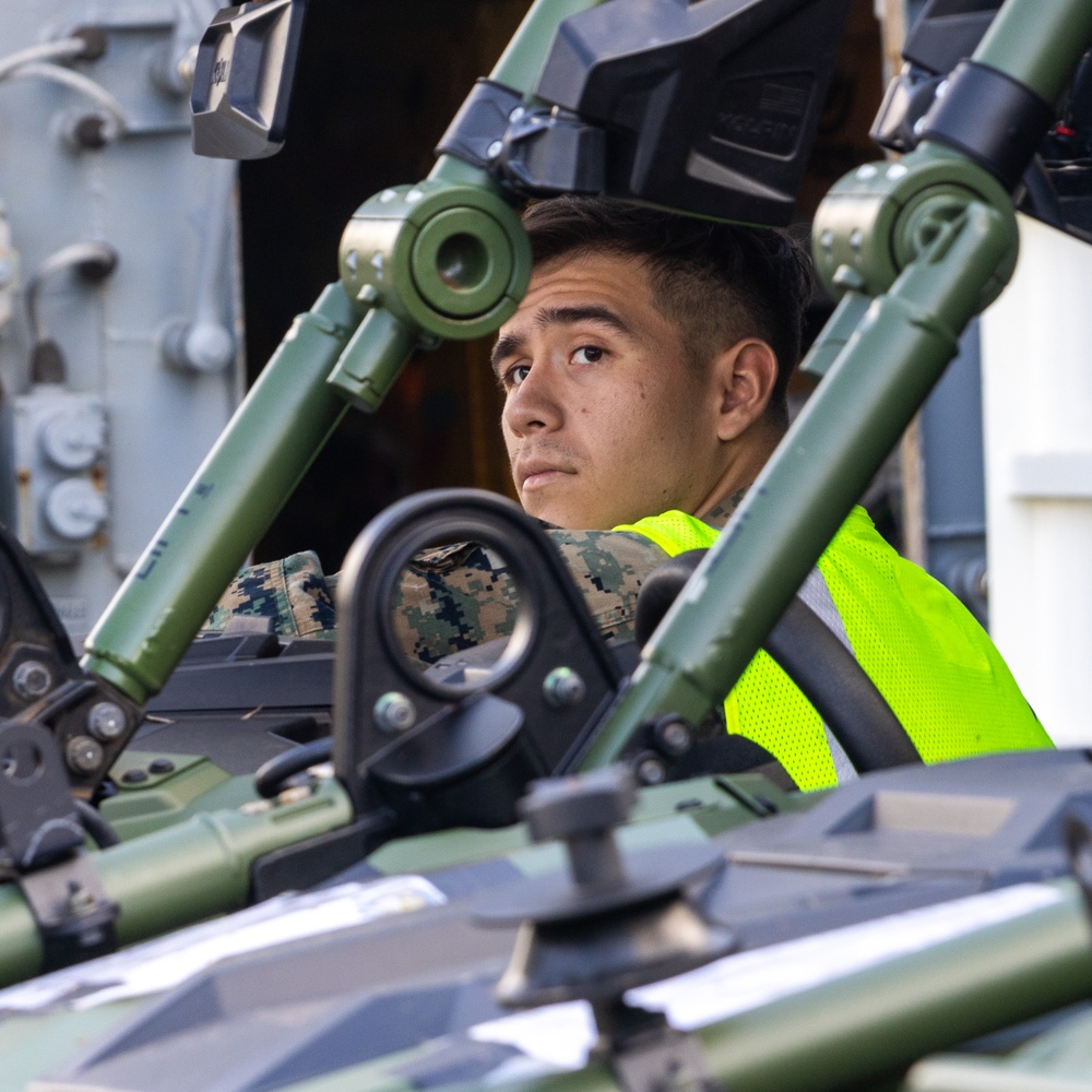 US Army Mariners load US Marines' gear onto LSV 4 for Big Island Combat Readiness Evaluation