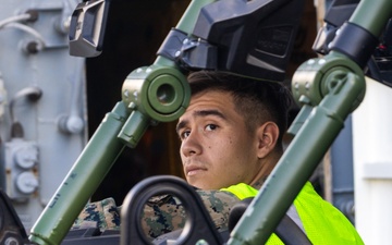 US Army Mariners load US Marines' gear onto LSV 4 for Big Island Combat Readiness Evaluation