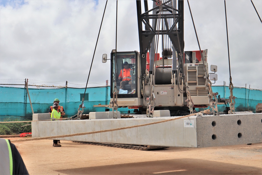 A Crane Operator Lifts a Ten-Ton Precast Concrete Slab During a Load Test