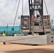 A Crane Operator Lifts a Ten-Ton Precast Concrete Slab During a Load Test