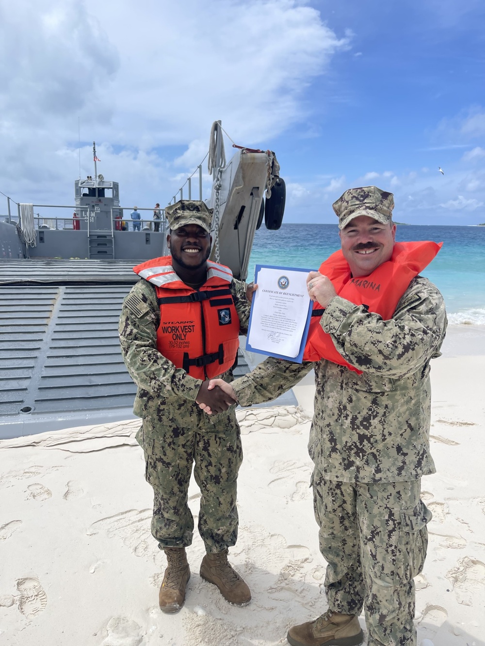 Det Diego Garcia congratulations BU2 Johnson on your reenlistment