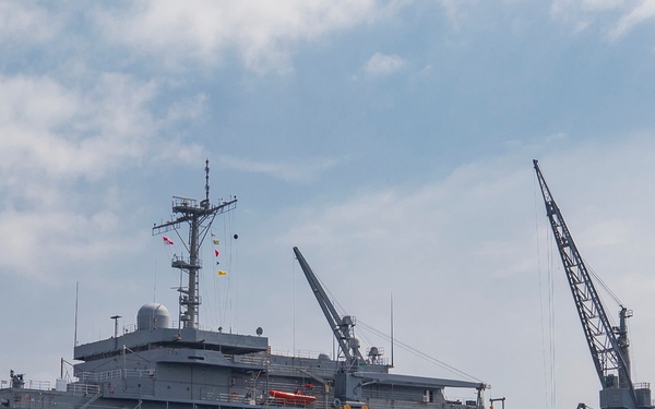 Emory S. Land conducts (AS 39) boat operations while anchored in the Andaman Sea