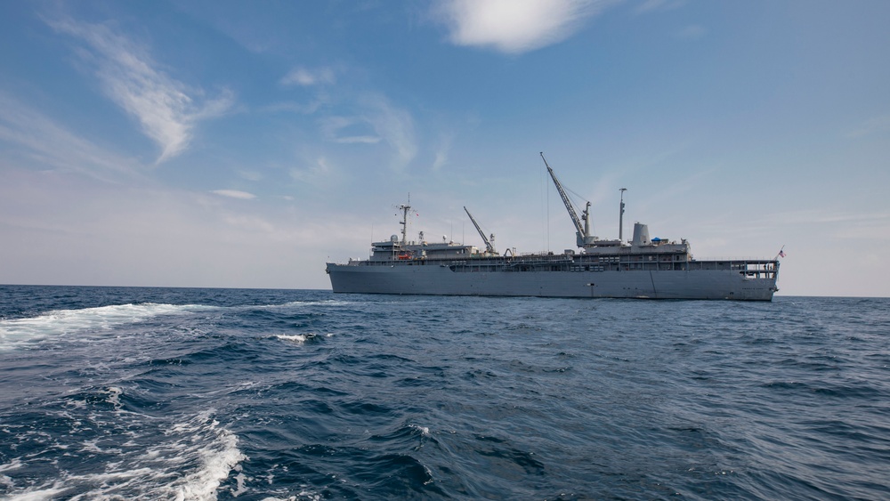 Emory S. Land conducts (AS 39) boat operations while anchored in the Andaman Sea