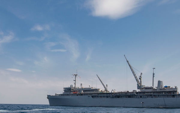 Emory S. Land conducts (AS 39) boat operations while anchored in the Andaman Sea