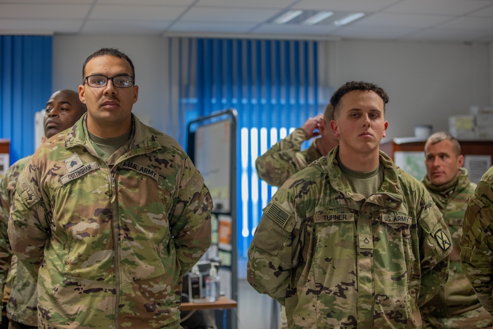 Lt. Gen. Joseph A. Ryan awards coins to 10th Mountain Soldiers during Combined Resolve 25-1