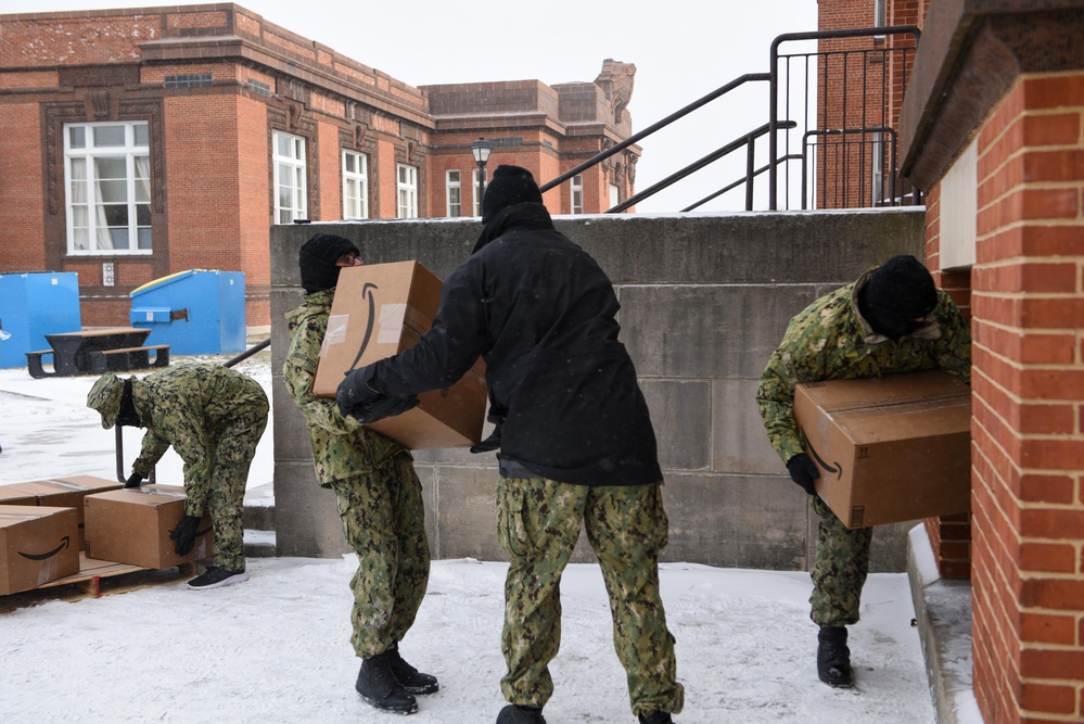 Accession-Level Sailors Move Boxes