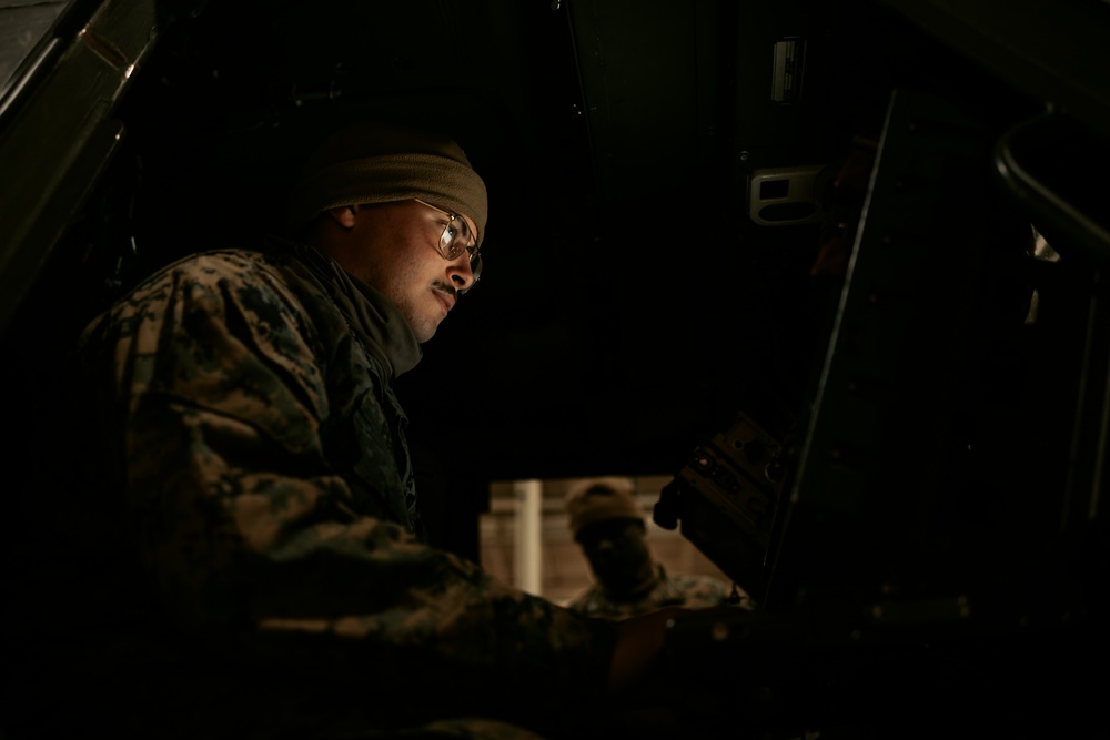 1st Bn., 11th Marines practices loading, offloading HIMARS onto C-17 Globemaster III