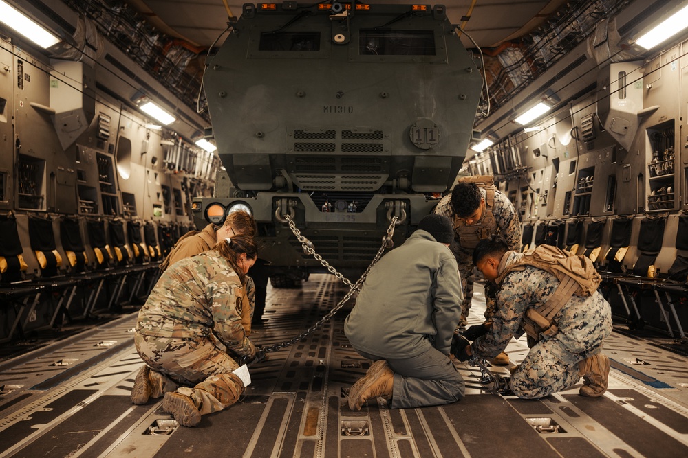 1st Bn., 11th Marines practices loading, offloading HIMARS onto C-17 Globemaster III