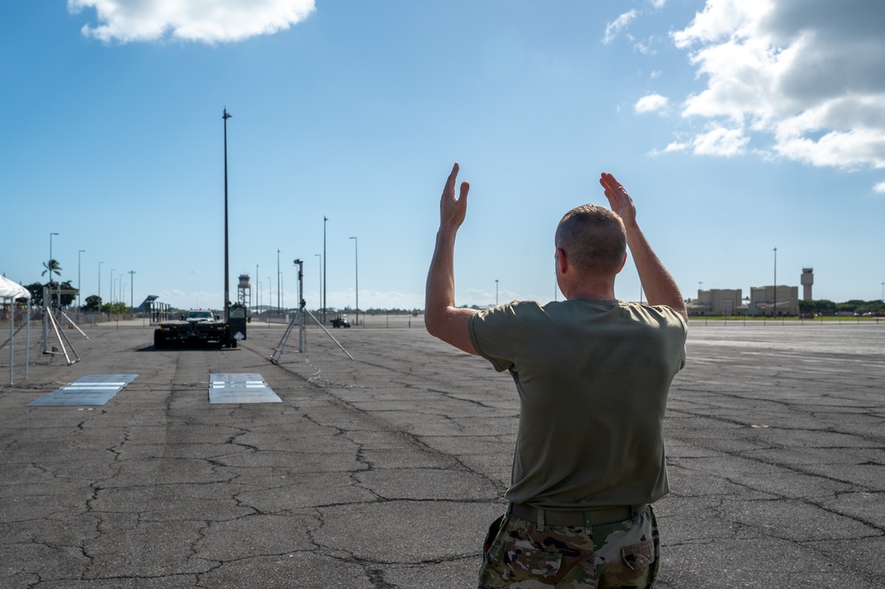 The 647th Logistics Readiness Squadron use a Deployable Automated Cargo Measurement System