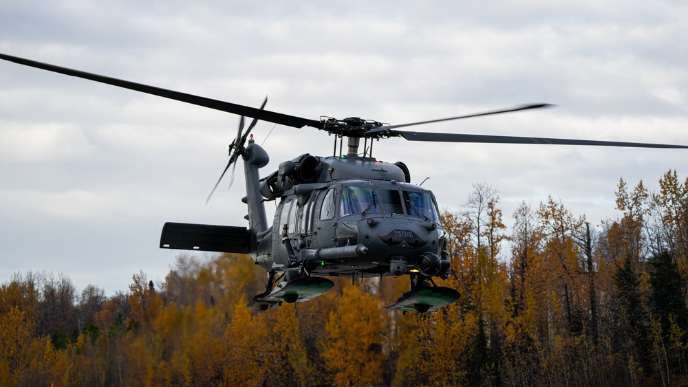 An Alaska Air National Guard HH-60G Pavehawk departs Joint Base Elmendorf Richardson