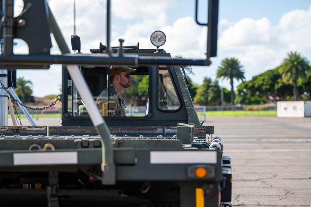 The 647th Logistics Readiness Squadron use a Deployable Automated Cargo Measurement System