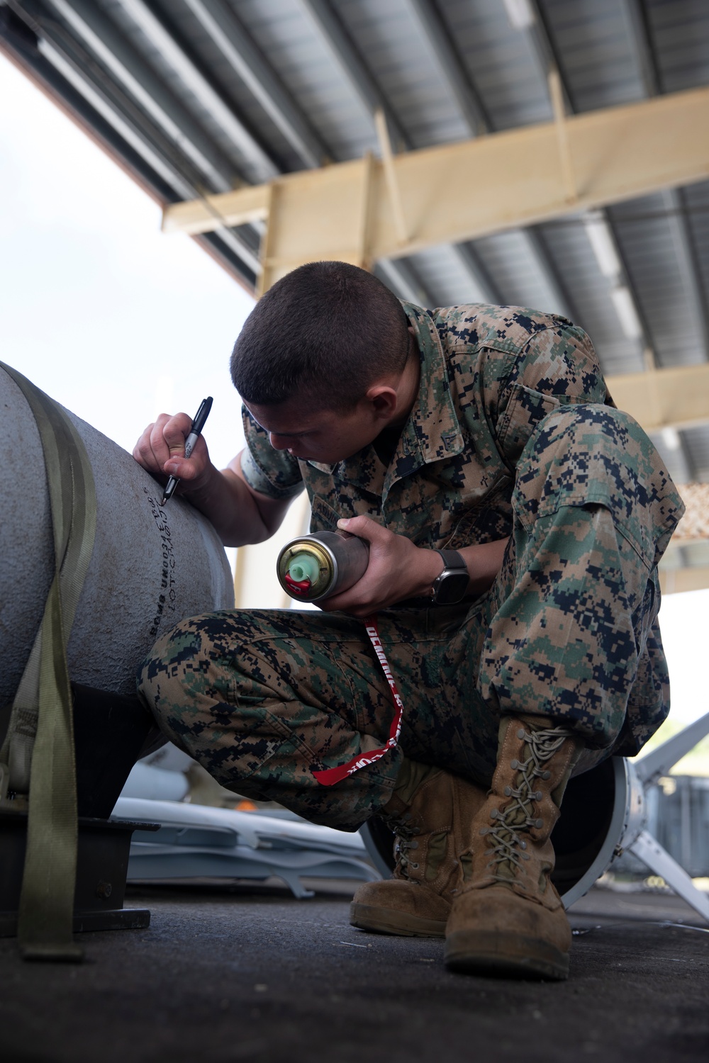 Ordnance Marines assemble bombs in Guam