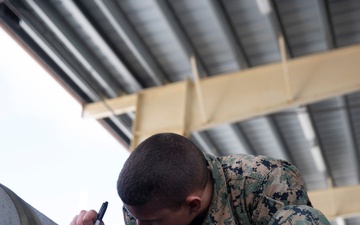 Ordnance Marines assemble bombs in Guam