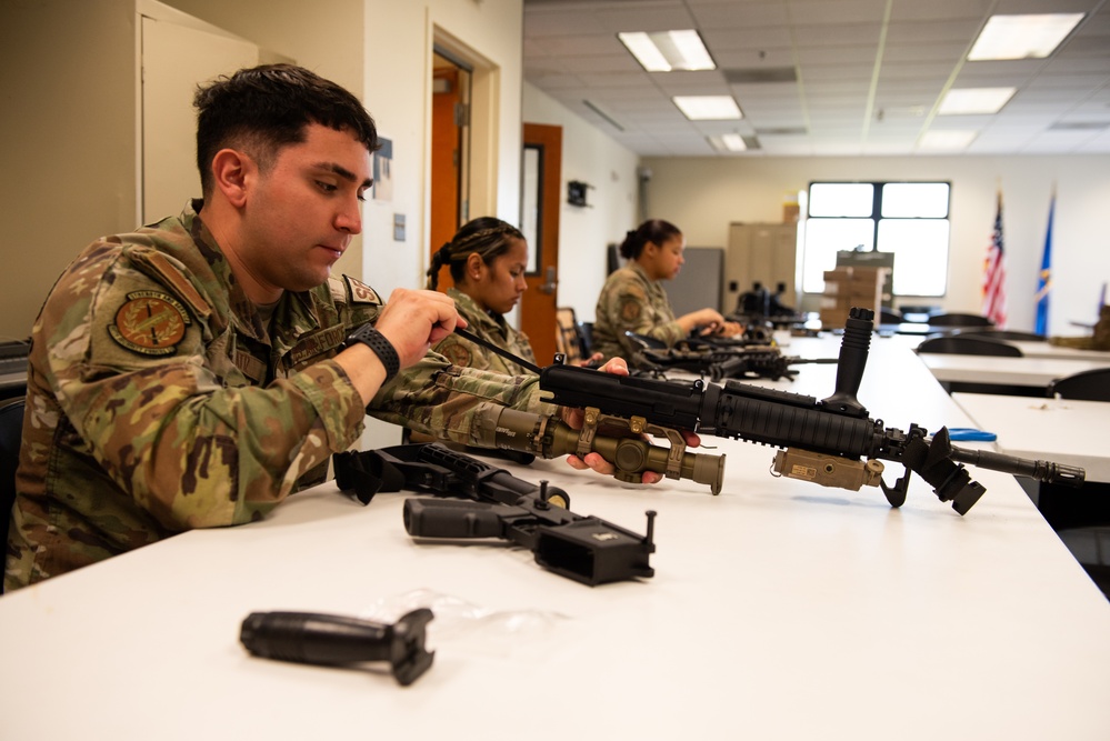 Practice Makes Perfect: 60th SFS sharpens skills during weapons proficiency training