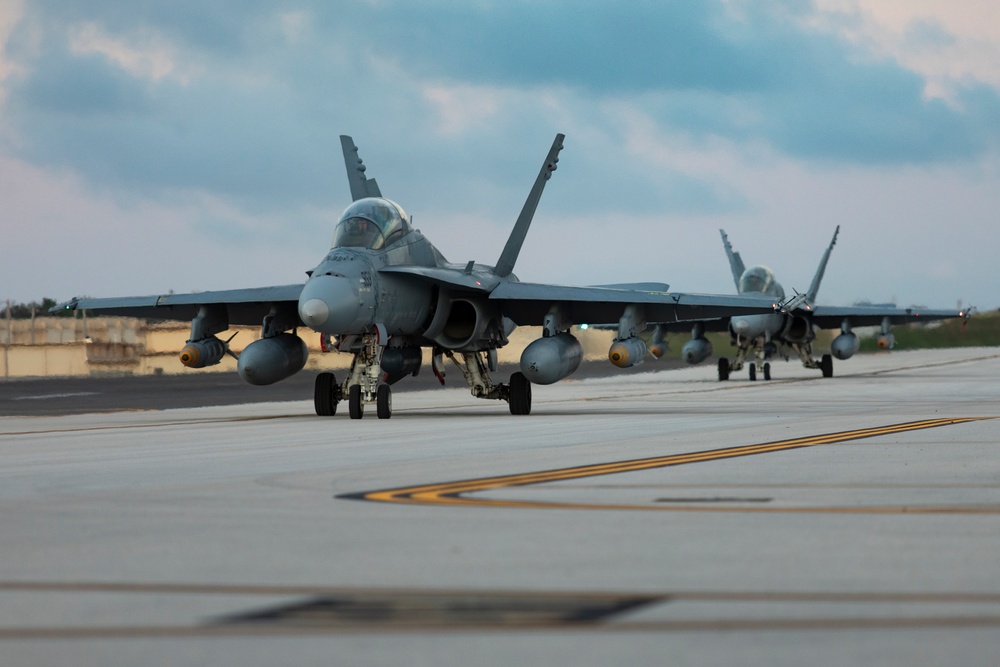 Marine F/A-18s fly armed at Andersen Air Force Base, Guam