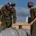 U.S. Marines transport and ready ordnance at Andersen Air Force Base