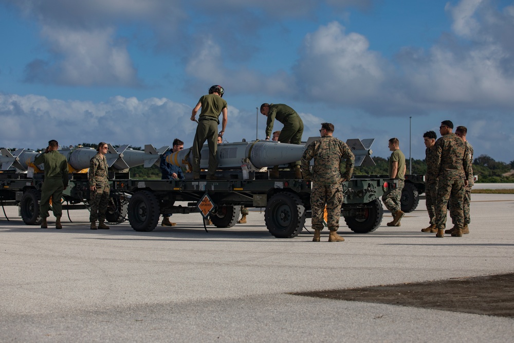 U.S. Marines transport and ready ordnance at Andersen Air Force Base, Guam