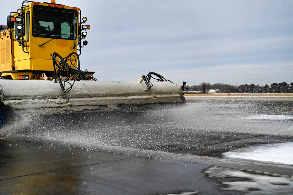 Airmen remove snow, ice for T-38 Talon, F-22 Raptor ops