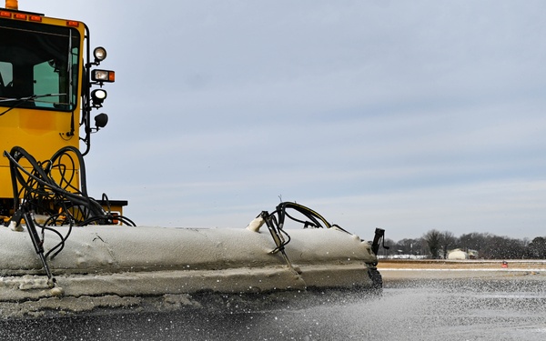 Airmen remove snow, ice for T-38 Talon, F-22 Raptor ops