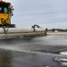 Airmen remove snow, ice for T-38 Talon, F-22 Raptor ops