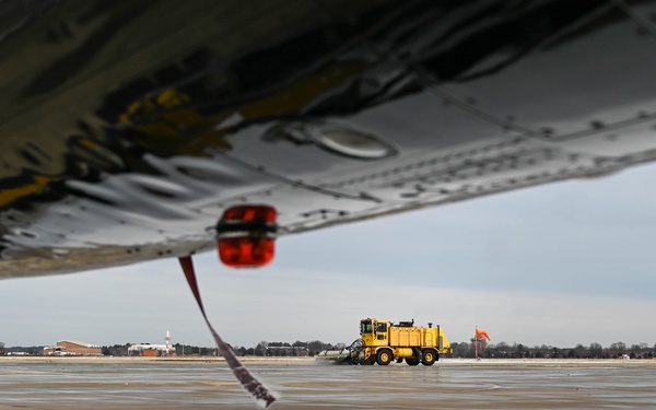 Airmen remove snow, ice for T-38 Talon, F-22 Raptor ops