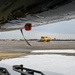 Airmen remove snow, ice for T-38 Talon, F-22 Raptor ops