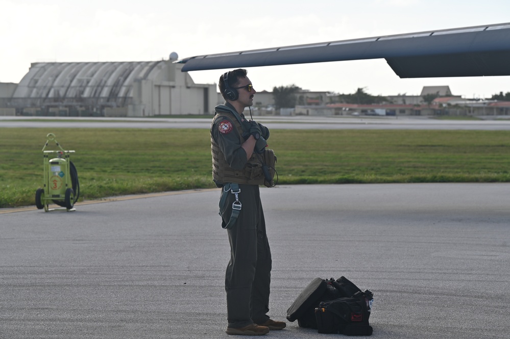 A 34th Expeditionary Bomb Squadron pilot awaits queue to ascend into a B-1B Lancer during BTF 25-1