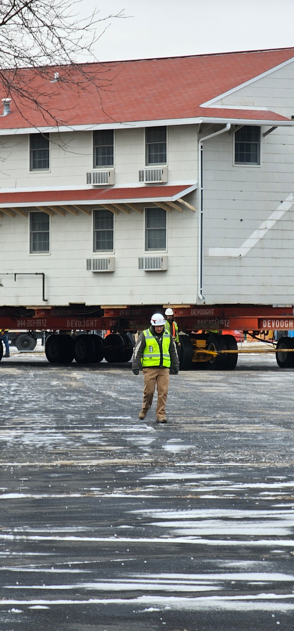 Contractors move first of five World War II-era barracks in 2025