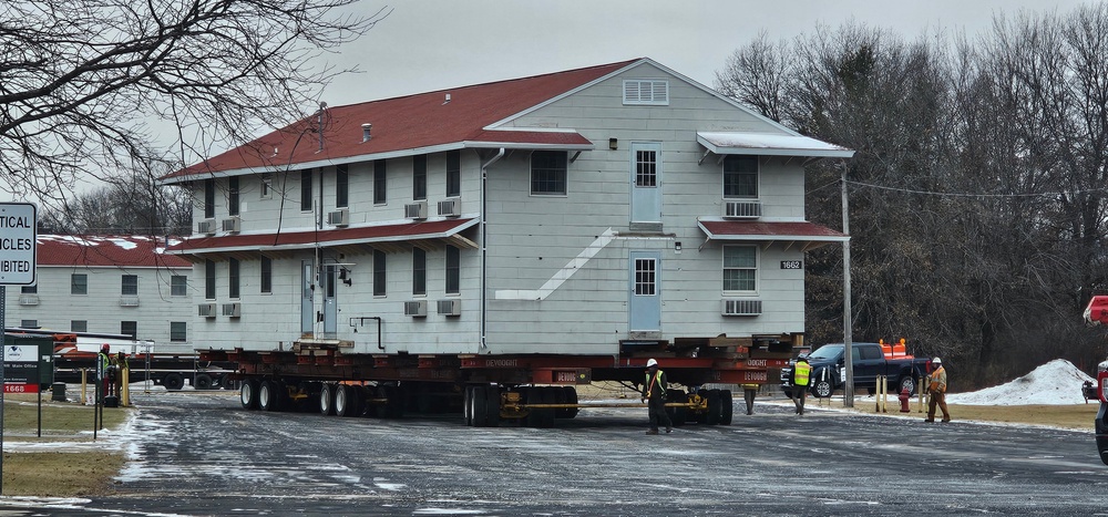 Contractors move first of five World War II-era barracks in 2025