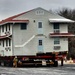 Contractors move first of five World War II-era barracks in 2025