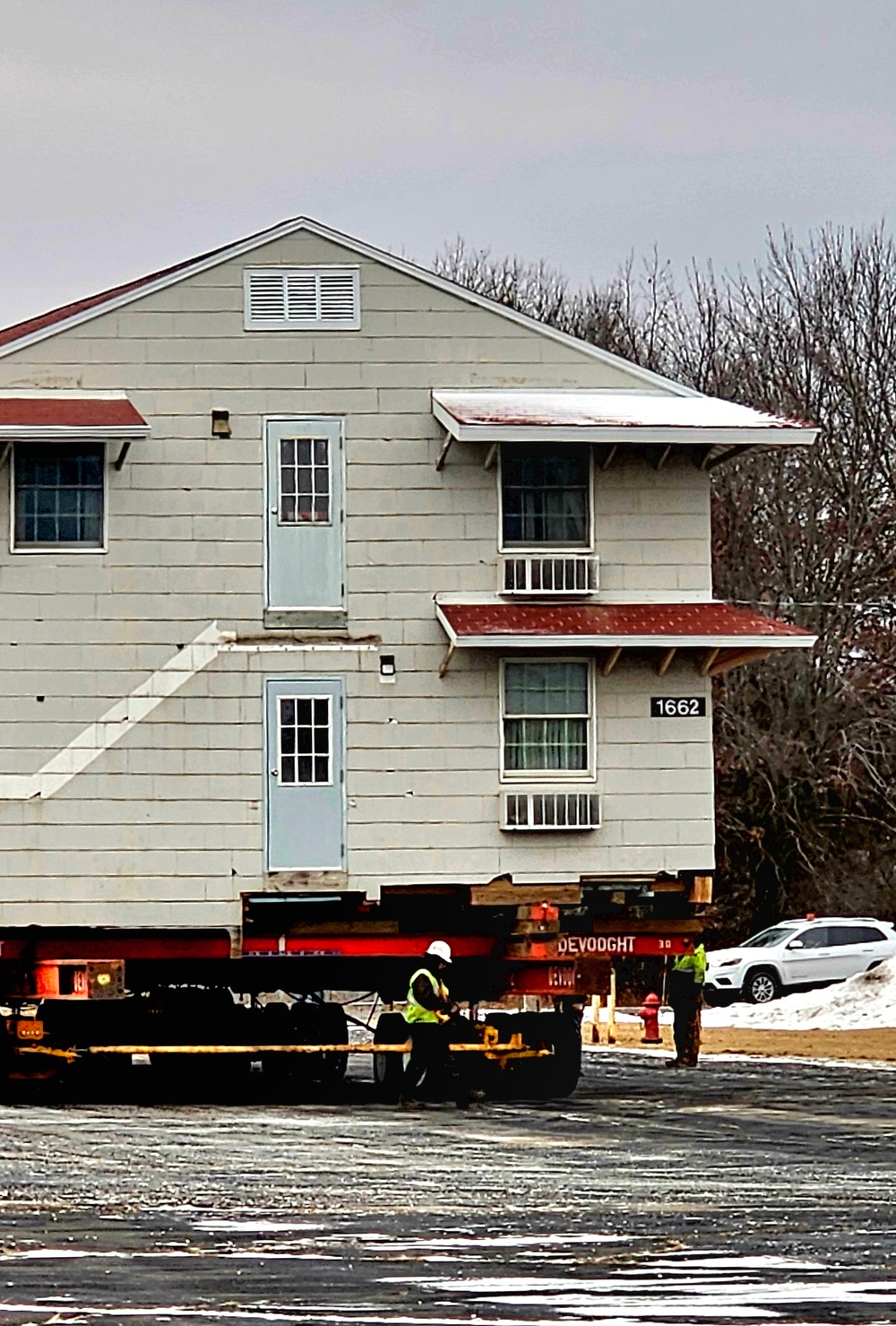 Contractors move first of five World War II-era barracks in 2025